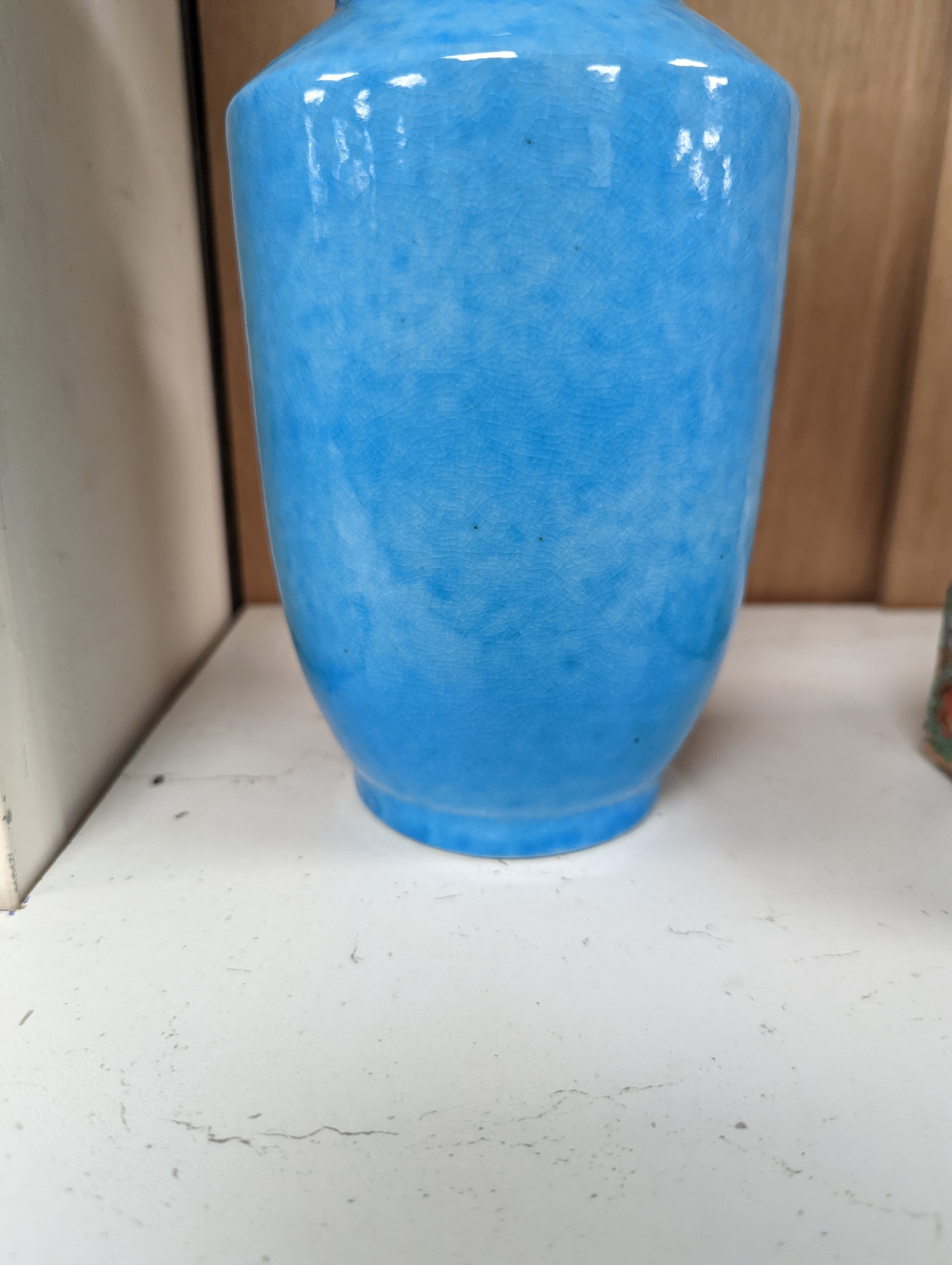 A Chinese turquoise glazed vase 22cm, with a fine crackle to the exterior glaze